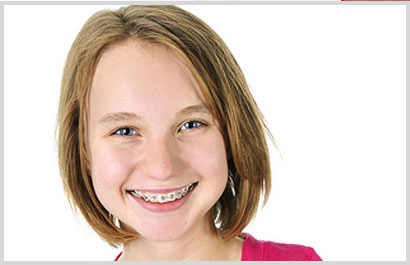 smiling girl with braces